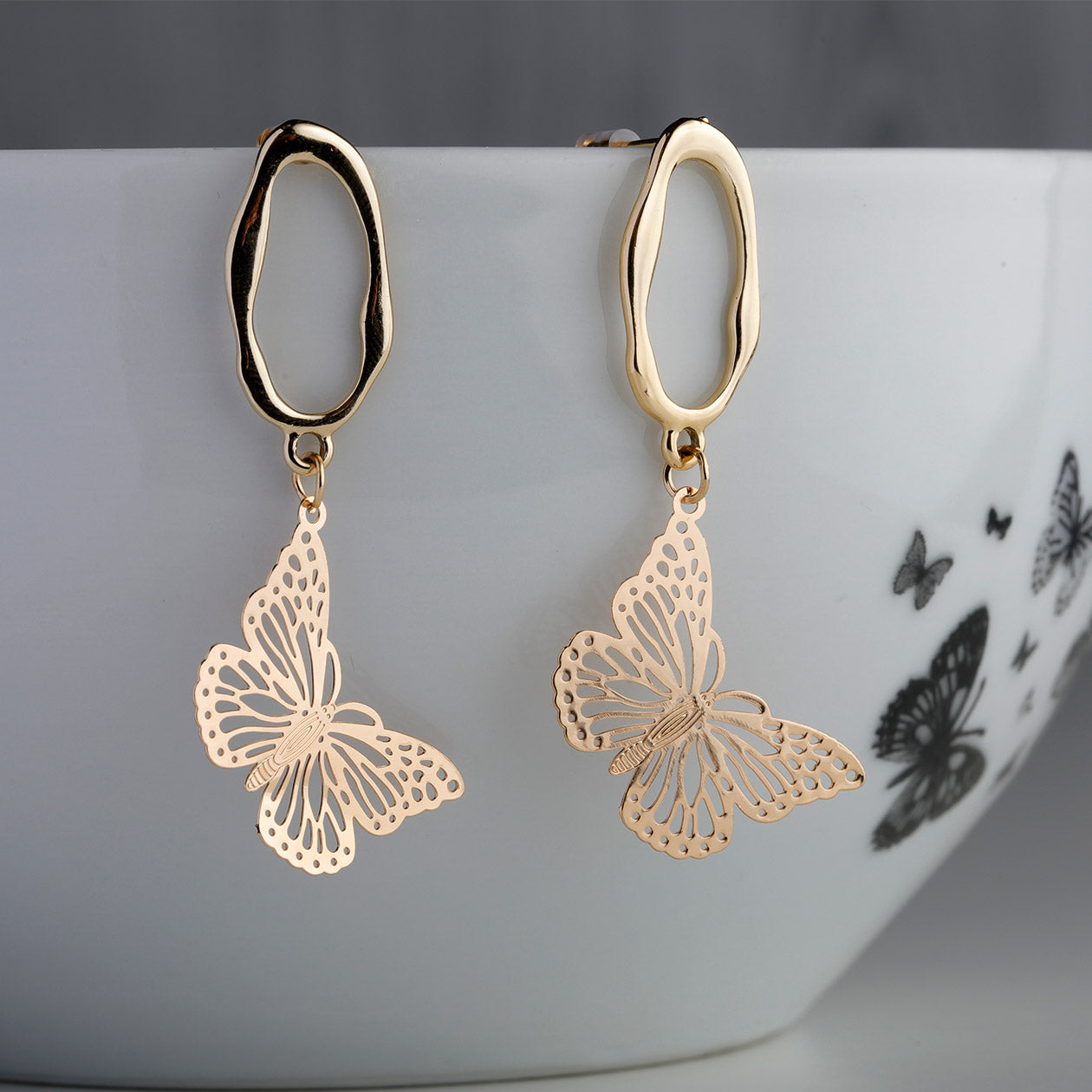 Heartline Glow Drops - Dainty butterfly shaped drops earrings golden finish