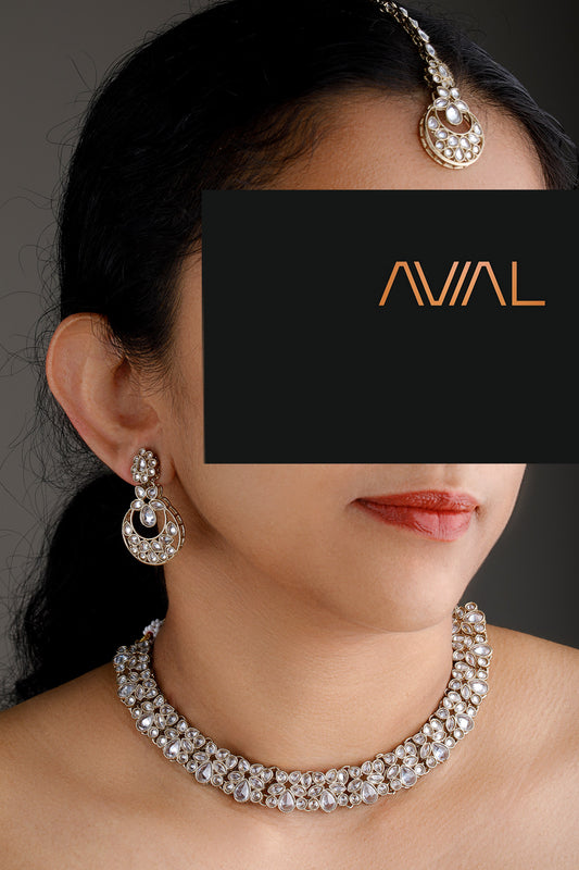 Antique gold Polki diamond jewellery set with choker necklace, earrings, and maang tikka – traditional Indian bridal jewellery UK