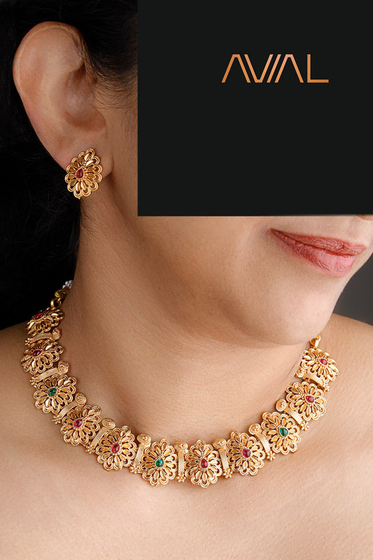 Gold floral choker necklace set with matching red and green stone stud earrings – perfect for weddings and traditional events in the UK