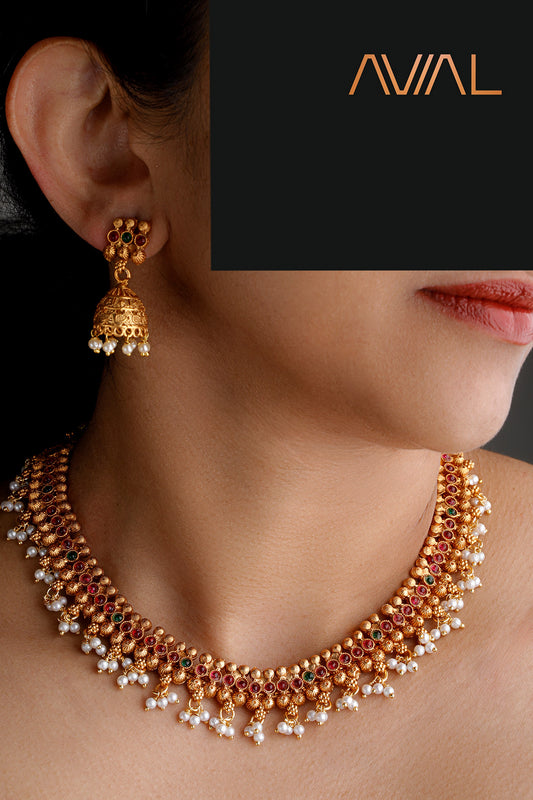 "Ruby and Emerald American Diamond Bridal Necklace and Earring Set with Gold Polish – Indian Wedding Jewelry" with beads