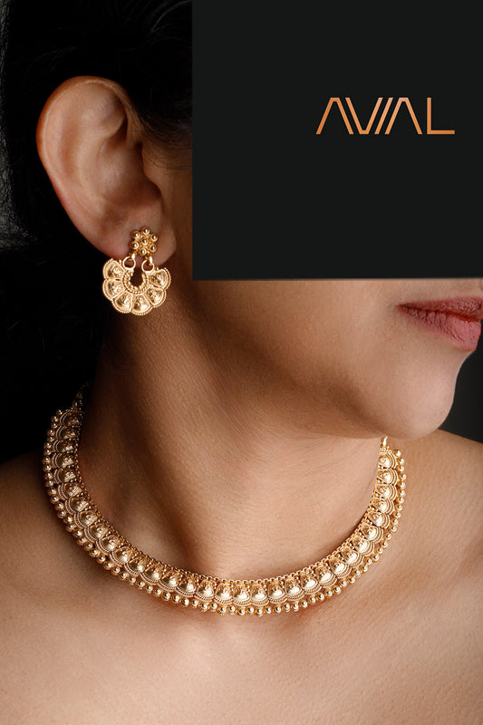 Traditional temple-style gold choker necklace set with fan-shaped stud earrings – perfect for weddings and festive events in the UK