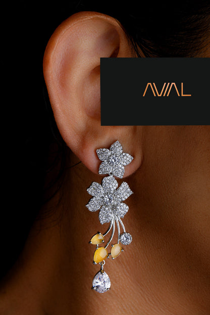 Matching floral drop earrings with yellow stones and American diamonds – silver finish jewellery set UK