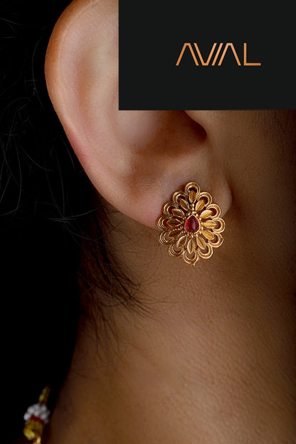 Elegant gold finish floral stud earrings with red and green stones – a perfect match for ethnic and festive outfits in the UK