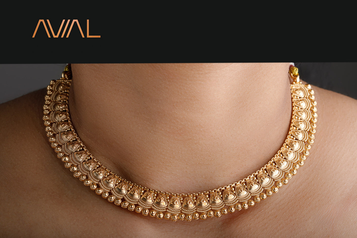 Classic gold-finish temple design choker necklace for women – ideal for bridal and festive wear in the UK.
