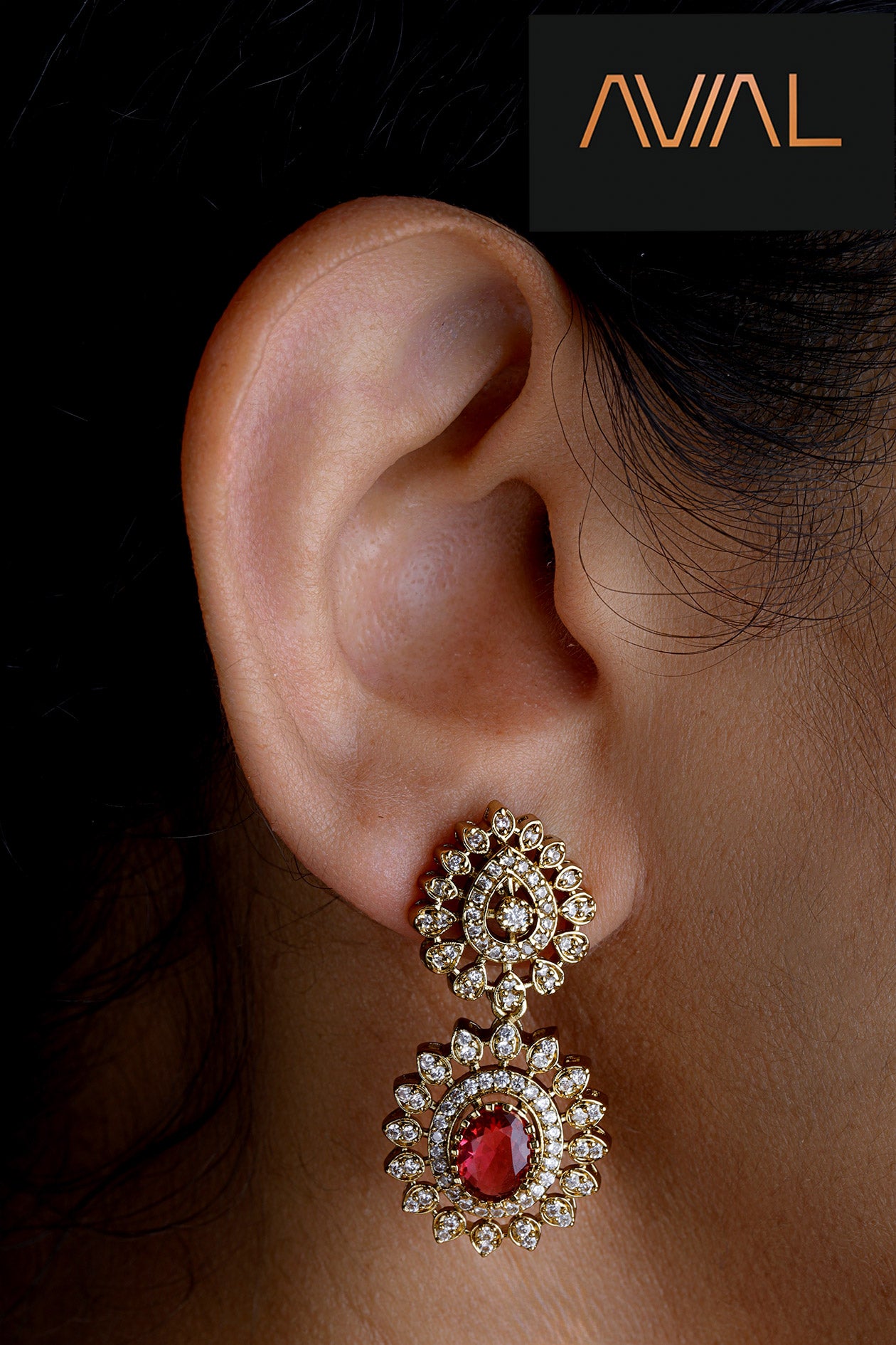 Woman wearing Desi Dusk antique gold earrings with red stone and kundan-style detailing – perfect for South Indian festive looks in the UK