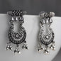 Bring a touch of vintage charm to your look with these oxidised look finish earrings clear