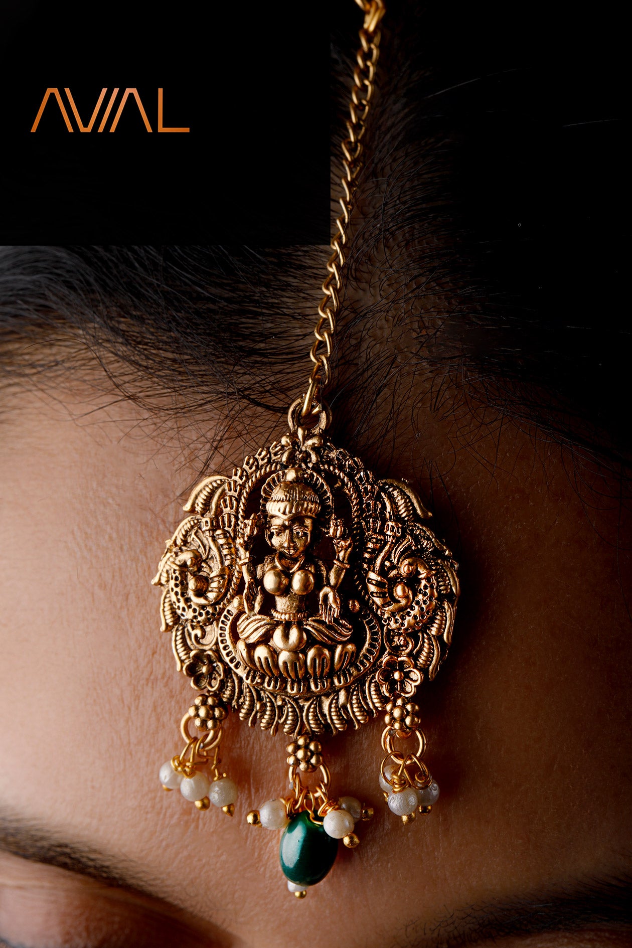 Goddess Lakshmi maang tikka in antique gold with pearl drops – traditional Indian bridal headpiece