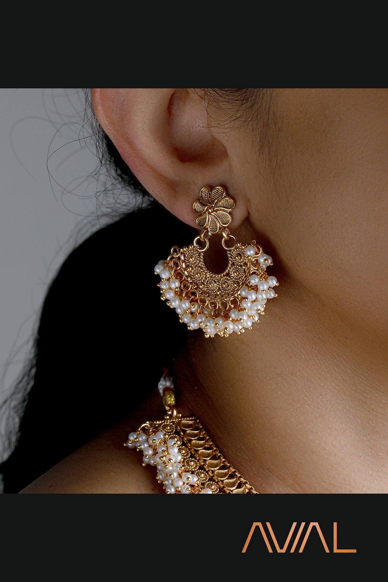 South Indian temple jhumka earrings with antique gold finish and pearl drops