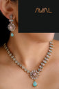 Mint green and baby pink necklace and earrings set with golden polish and American diamonds for bridal or party wear